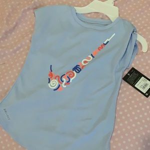 Blue Nike Dri-Fit shirt. Size is 6x